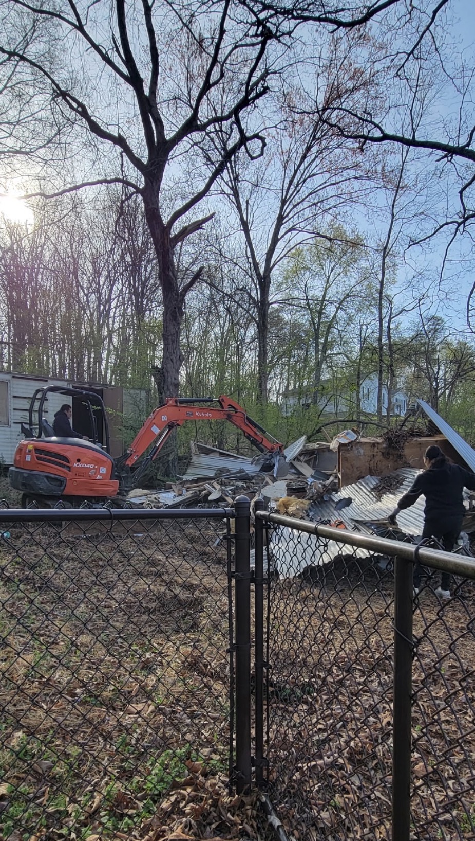 Property cleanout and structure removal in progress